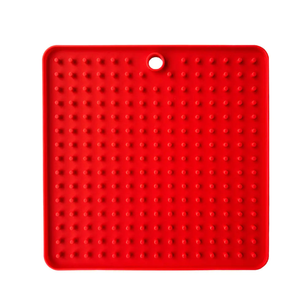 Silicone lick mat with suction-textured surface